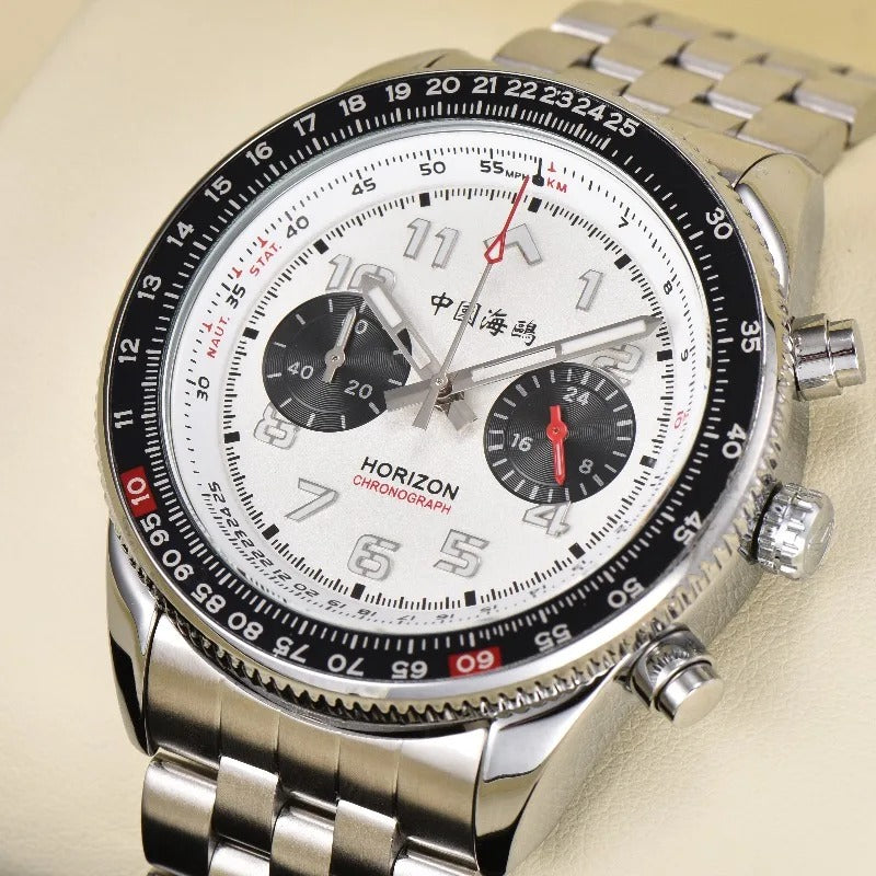 Seagull Horizon Chronograph watch with a polished stainless steel finish, white dial featuring black subdials and red accents, and a distinctive black rotating bezel