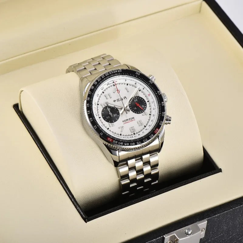 Photography of a silver Horizon chronograph watch featuring a white dial, black subdials with red accents, "HORIZON" and "中国海湾" Chinese text, and a stainless steel bracelet, presented in a beige and black luxury display box